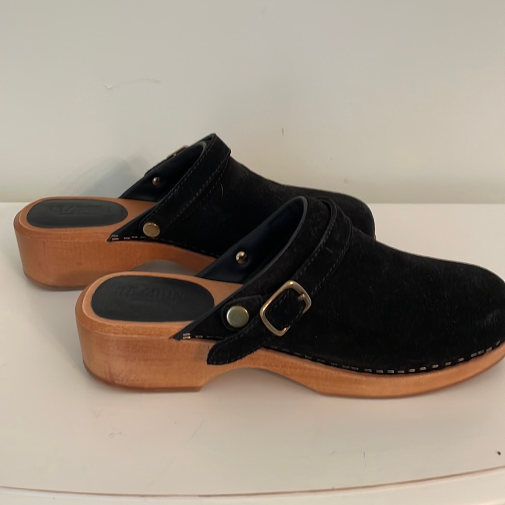 Black suede re/done clogs w gold accents.